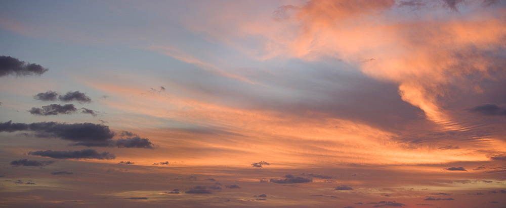 Sunlight from behind clouds