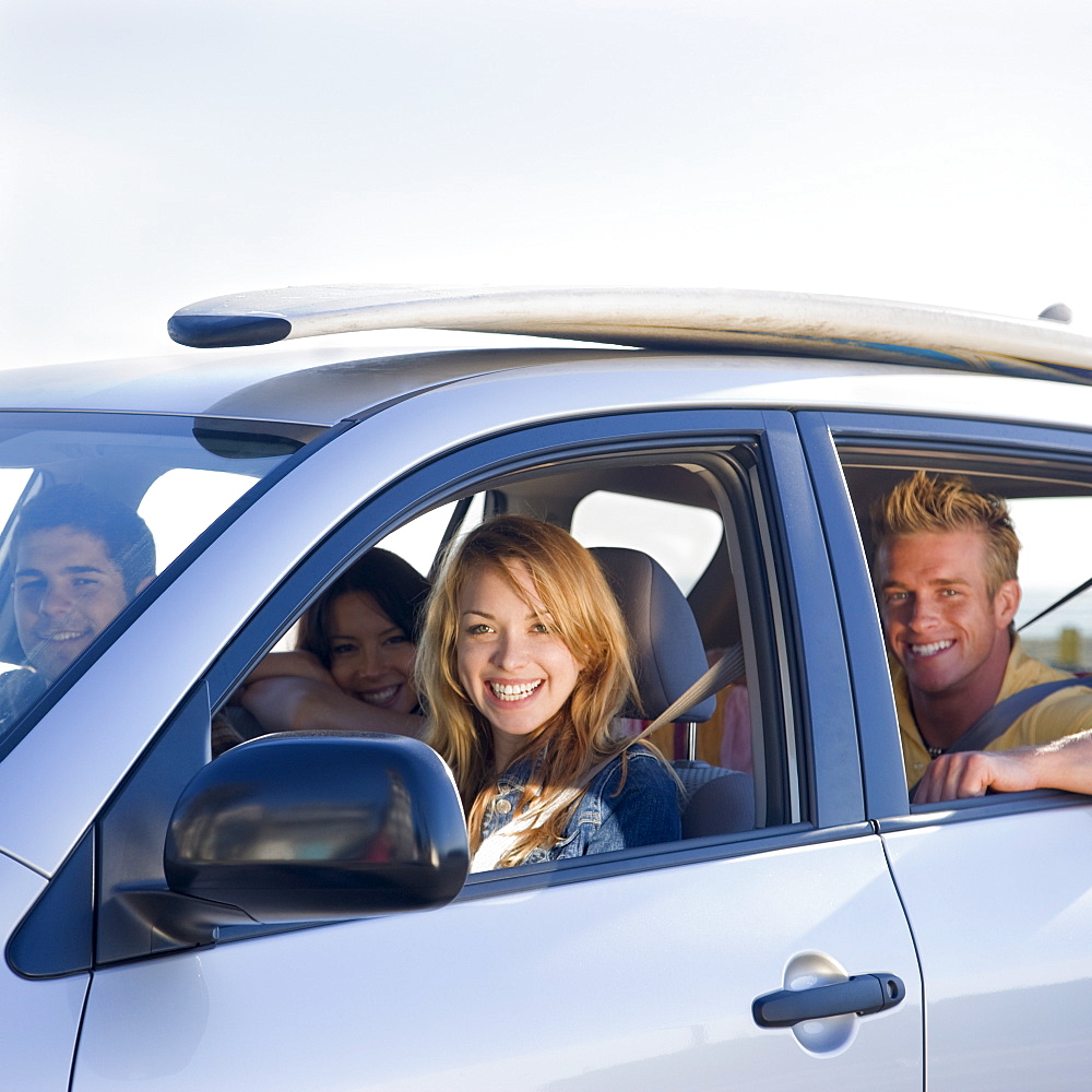 Friends driving in car