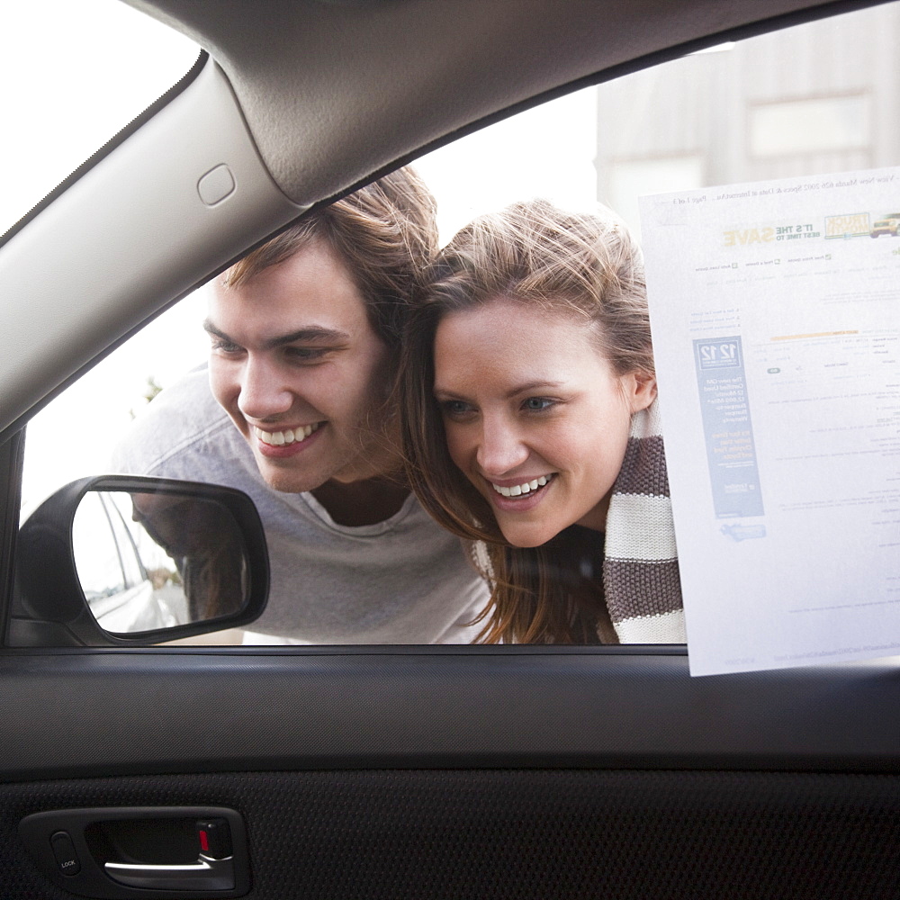 Couple shopping for new car