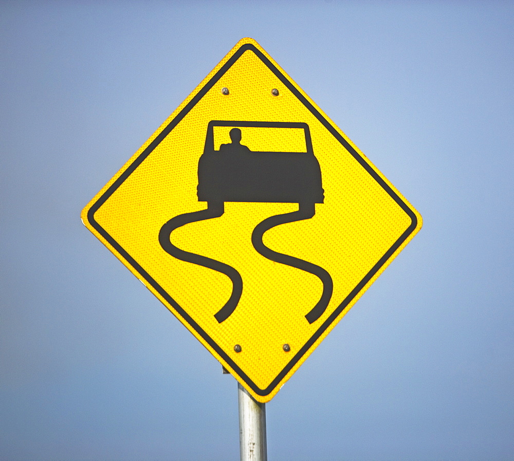 winding road sign