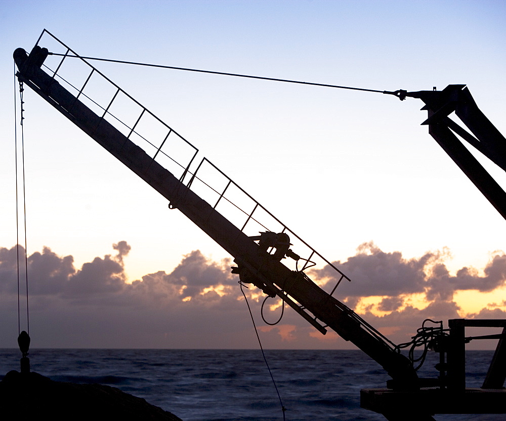 Construction crane in front of water