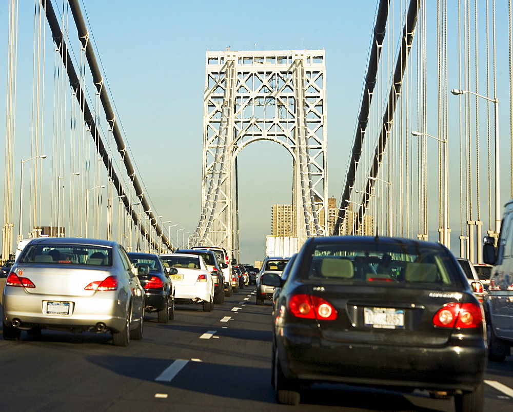 Cars moving across George Washington Bridge, New York