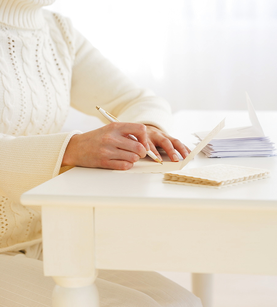 Woman writing cards