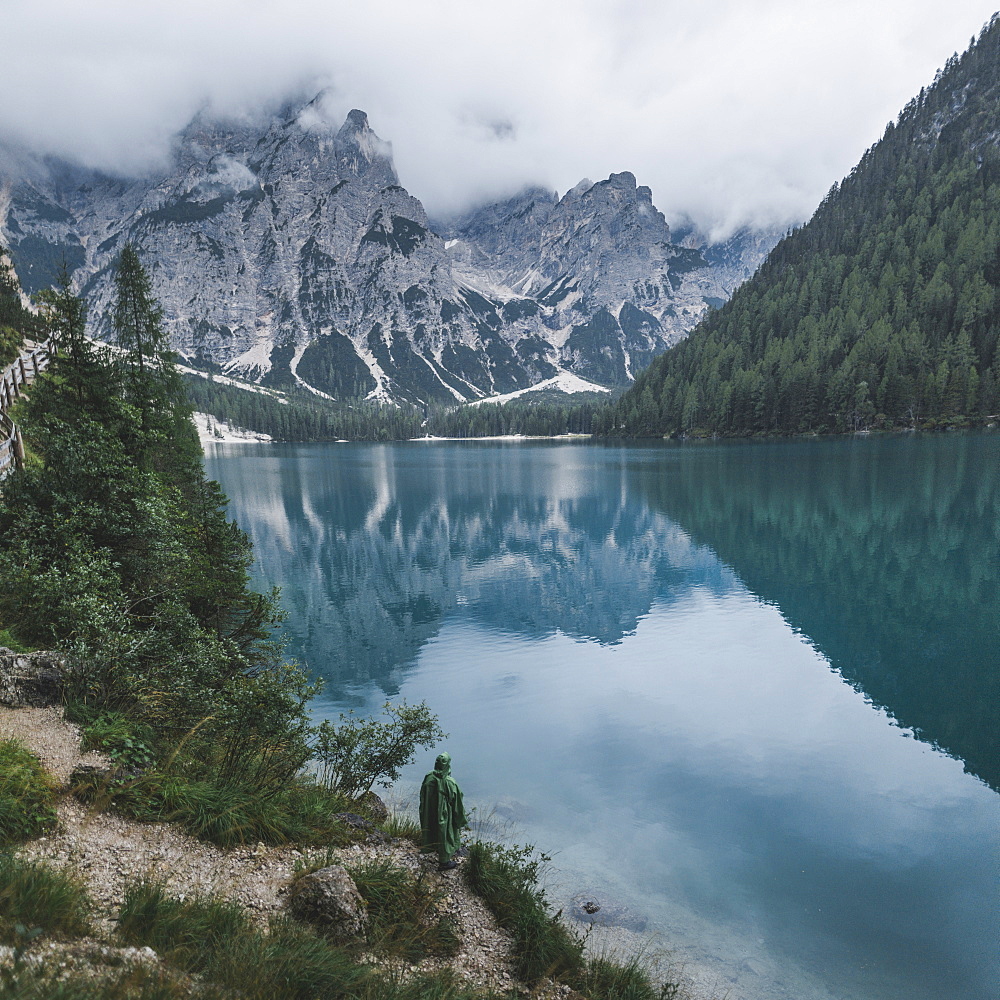 Italy, Mountains reflecting in Pragser Wildsee in Dolomites