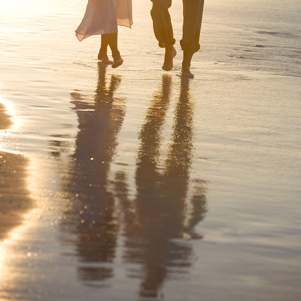 Couple strolling the beach