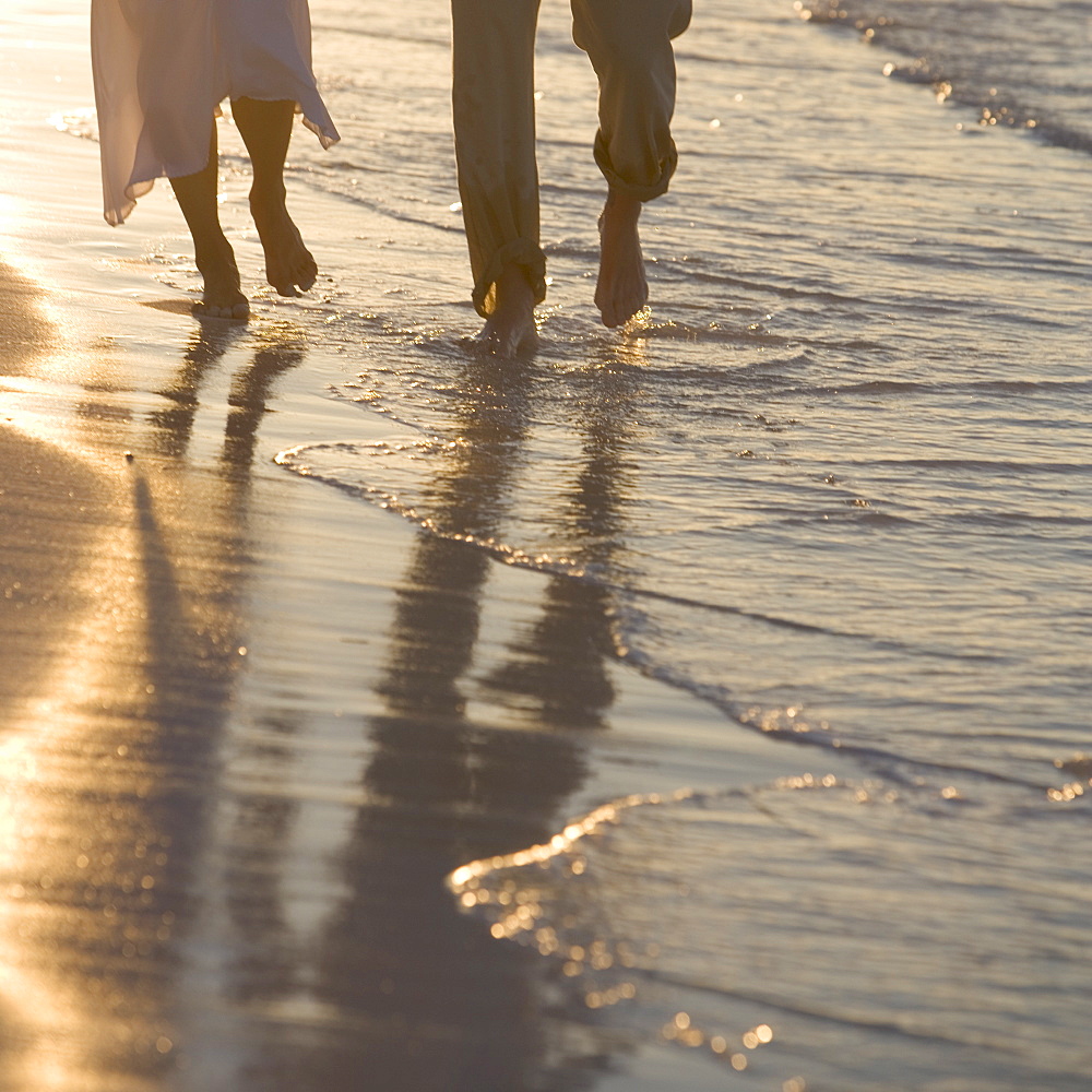 Couple strolling on a beach