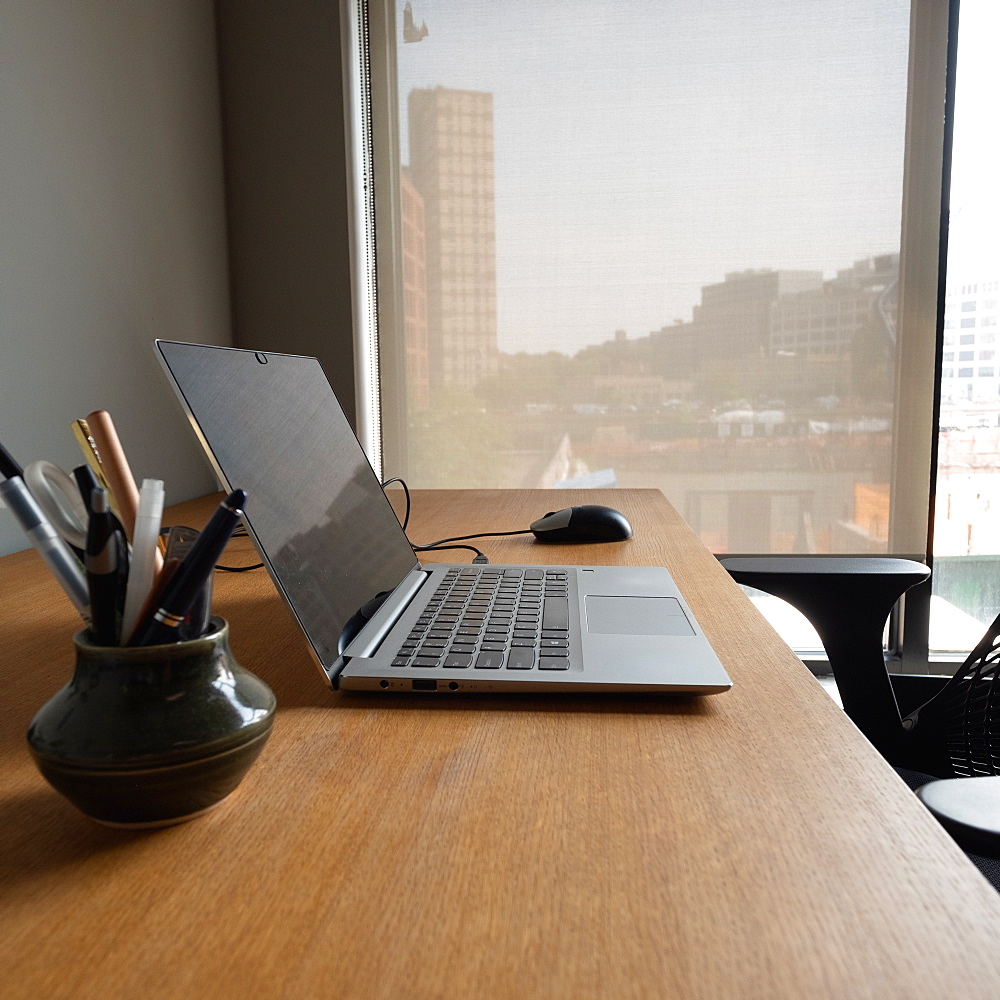 Open laptop on business desk