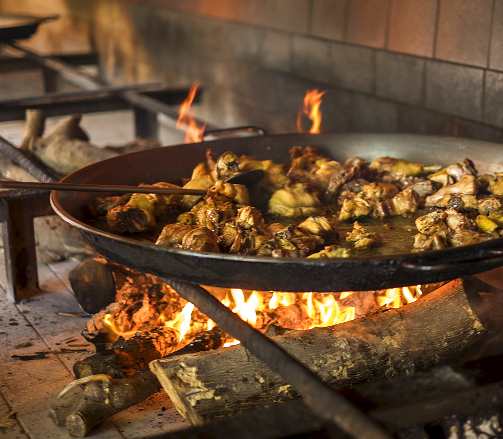 Paella on open fire stove, Valencia, Spain