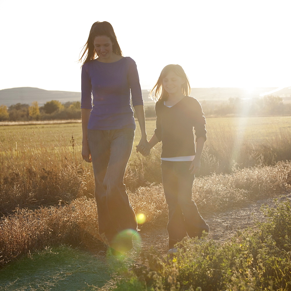 Mother and daughter walking