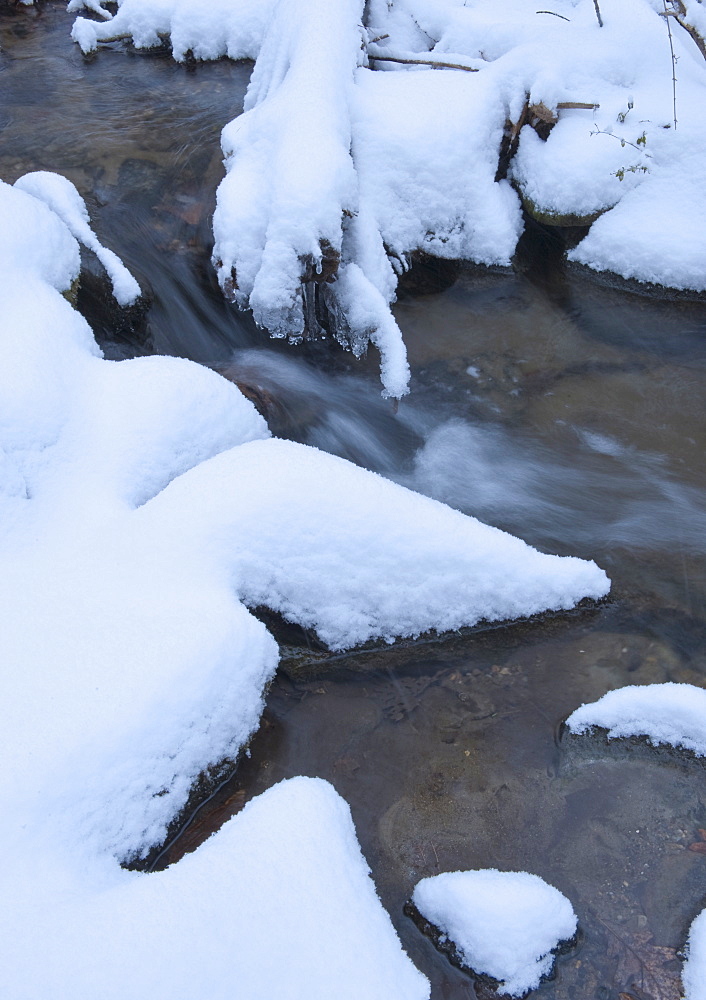 Snowy stream in winter
