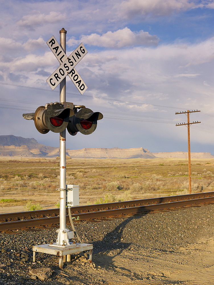 USA, Utah, Desert landscape with railroad crossing