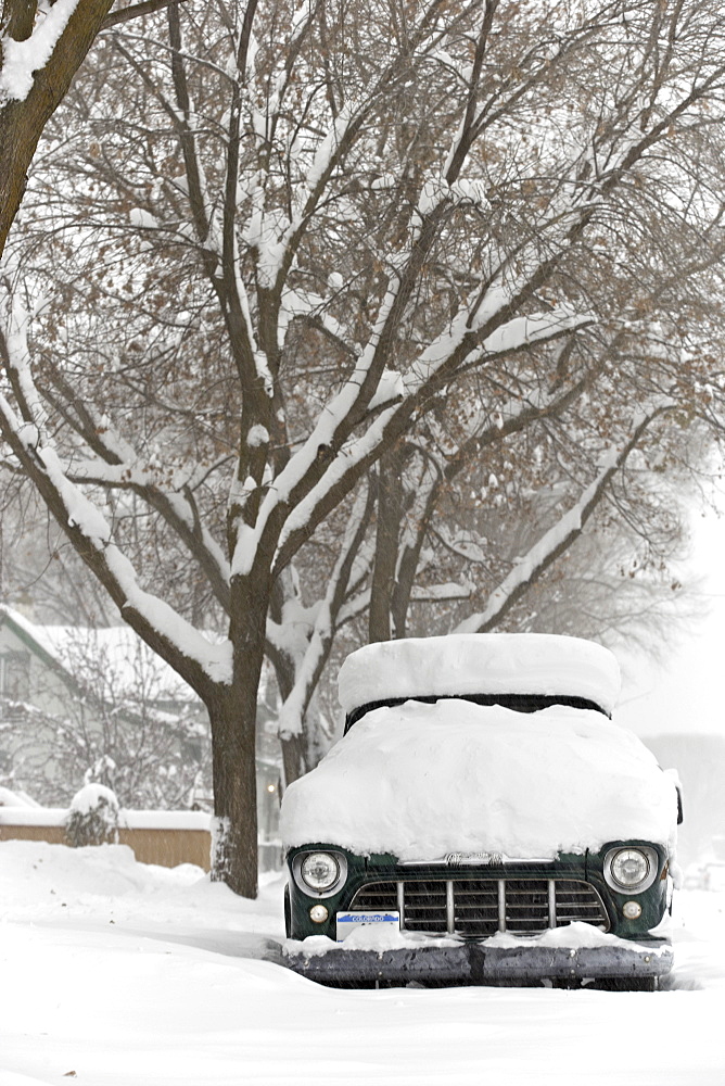 Snow covered car