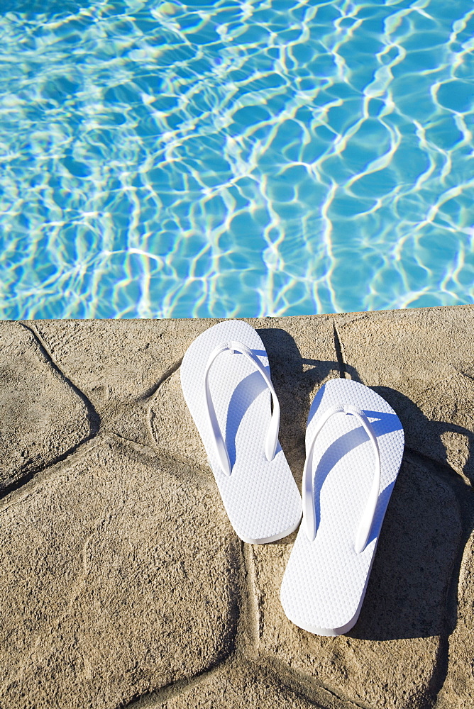 Flip flops by the pool