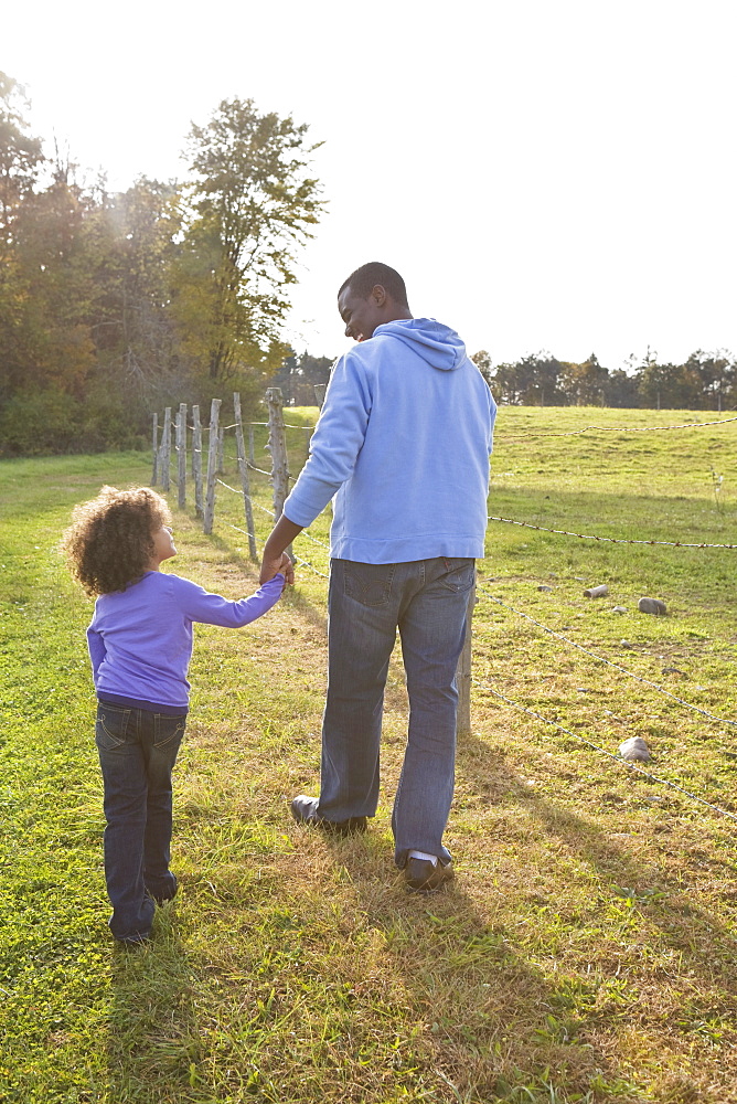 Father and daughter walking