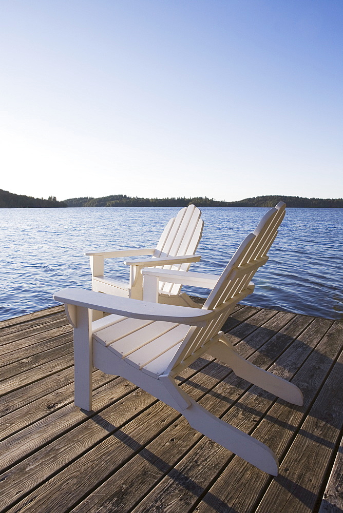 Adirondack chairs on dock