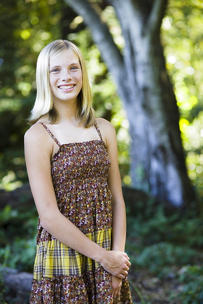 Young girl standing outside