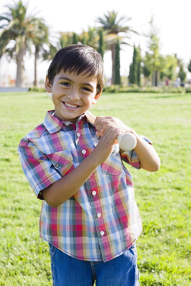 Boy holding baseball bat