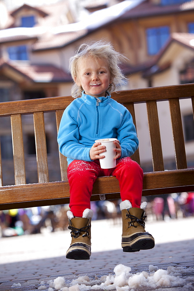 USA, Colorado, Telluride, Boy (4-5) enjoying hot chocolate