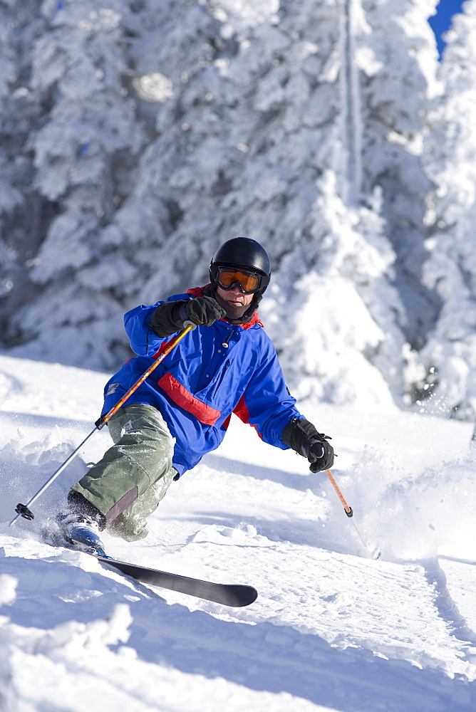 USA, Montana, Whitefish, Male skier on mountain slope