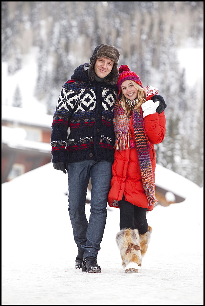 USA, Utah, Salt Lake City, Portrait of young couple walking in snow