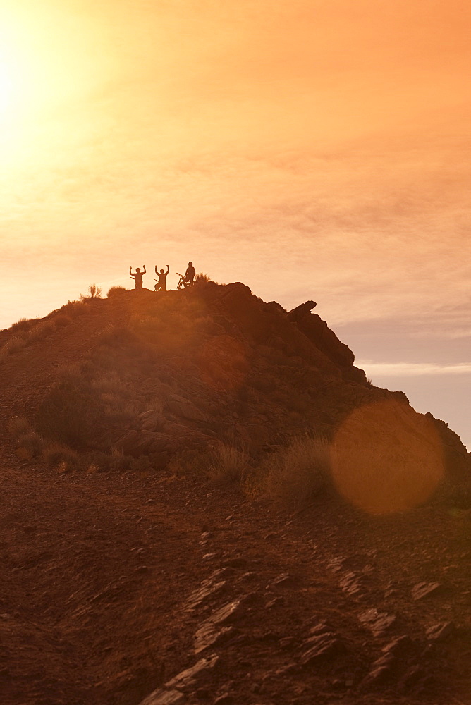 Mountain bikers on mountain peak