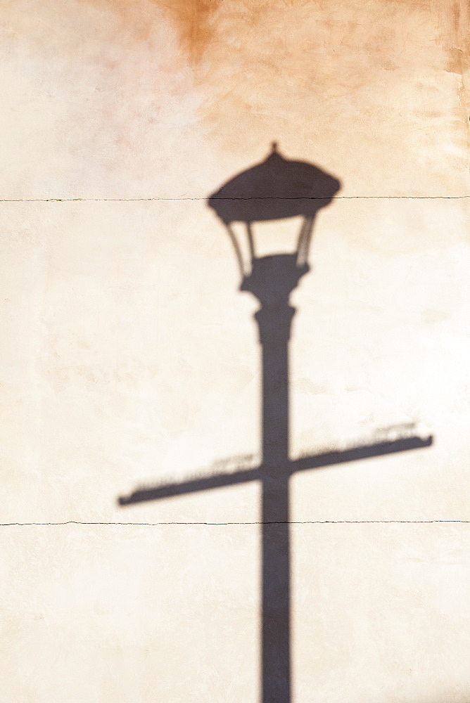 Shadow of street lamp on wall, Portland, Oregon