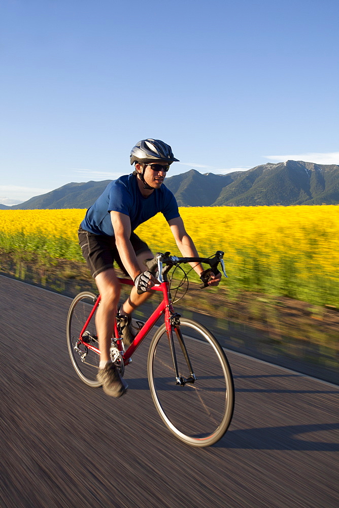 USA, Montana, Kalispell, Cyclist captured in motion, USA, Montana, Kalispell