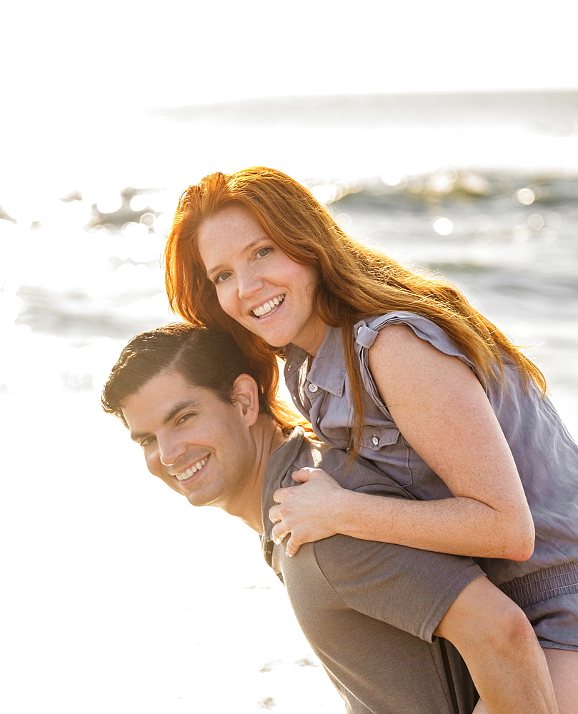 Portrait of couple on beach, Palm Beach, Florida