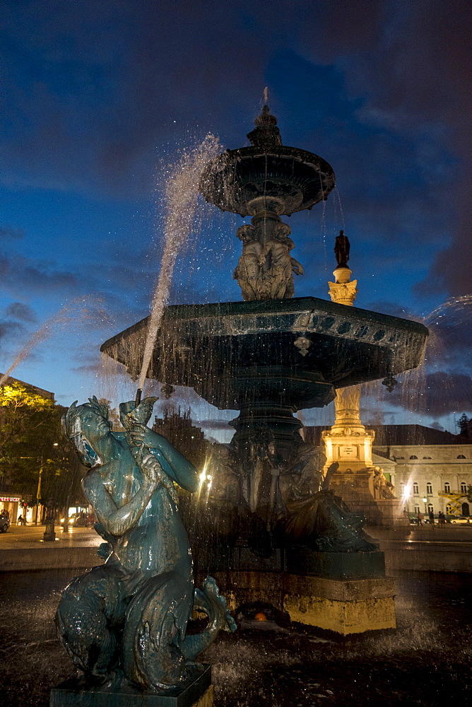 Fountain in Plaza de Pedro IV, Lisbon, Portugal