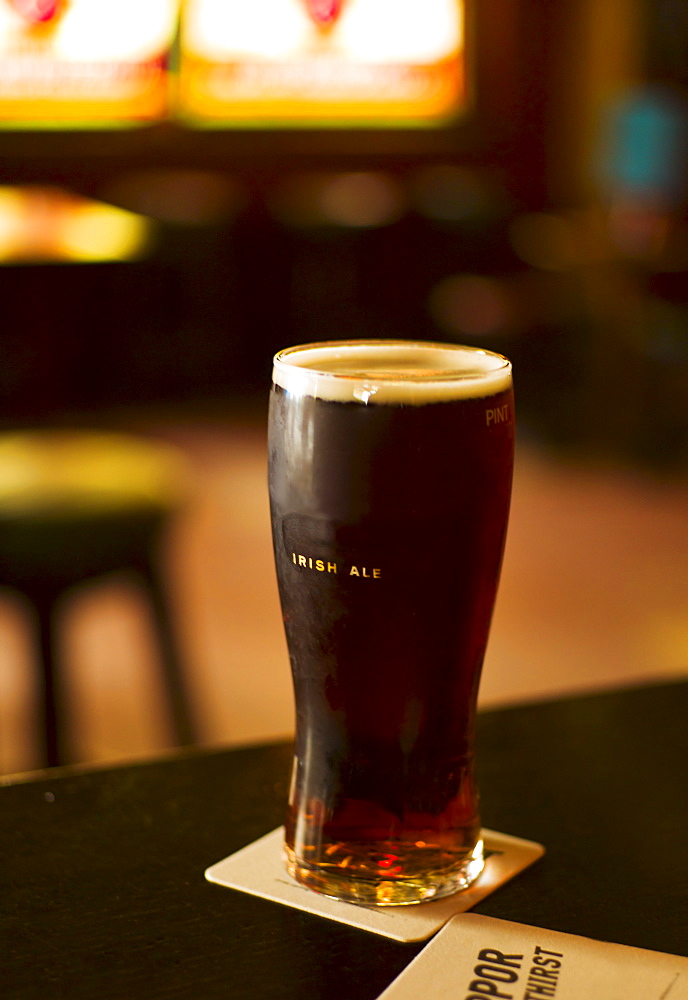 Glass of Irish ale in pub