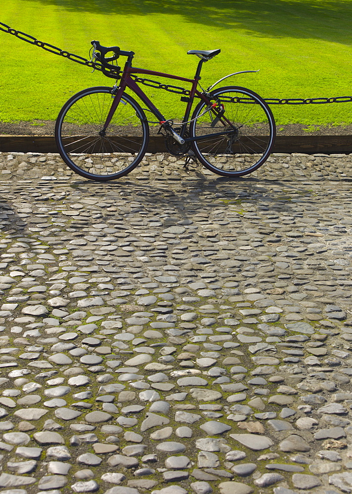 Bicycle on cobblestone path