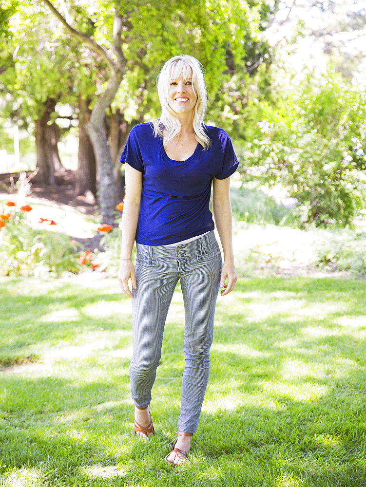 Portrait of blonde woman in park, USA, Utah, Salt Lake City 