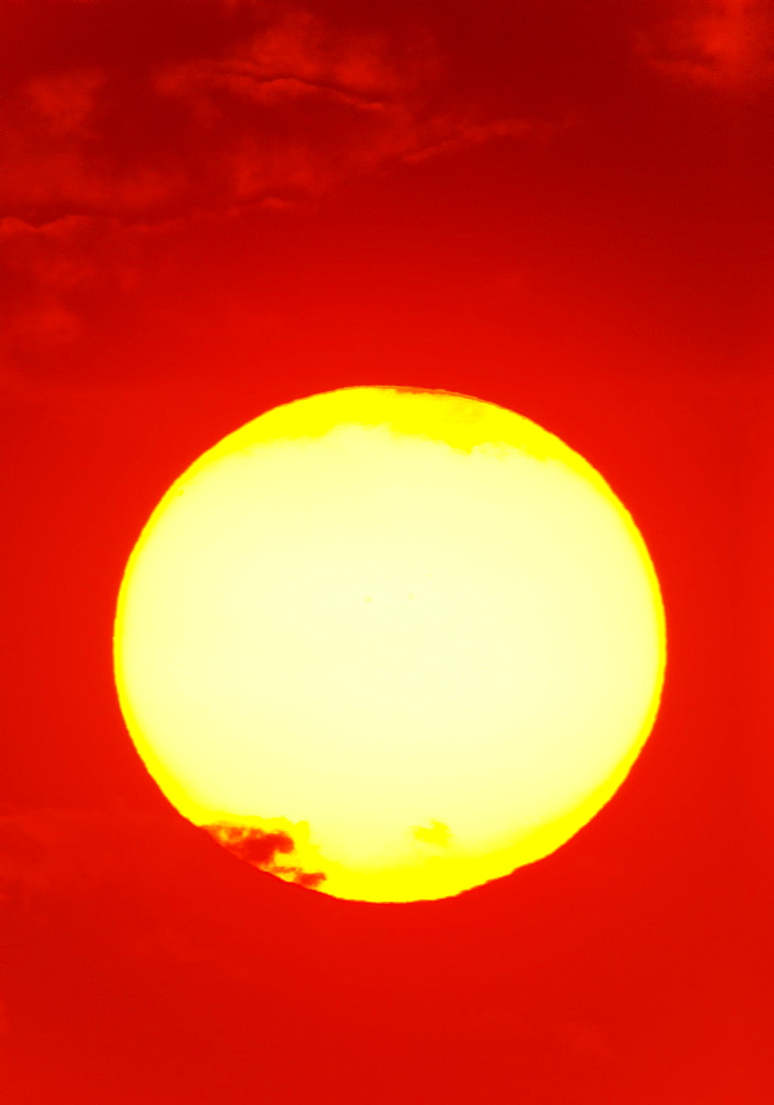 Close-up of large red sun