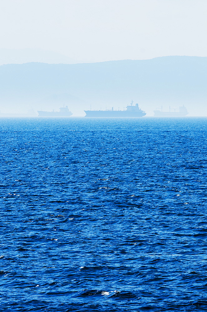 Greece, Oil tankers and cargo ships on Aegean Sea