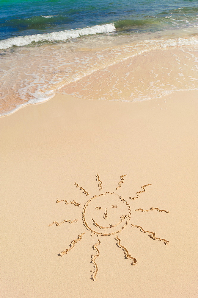 Sun drawing on beach