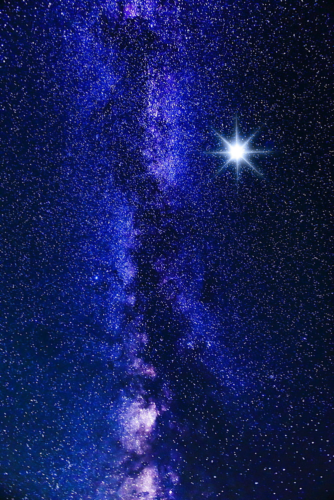 Milky way and big bright star
