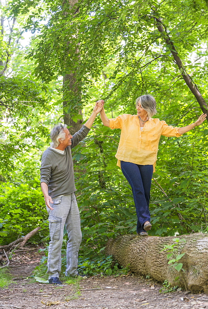 Senior couple hiking in forest, Central Park, New York City