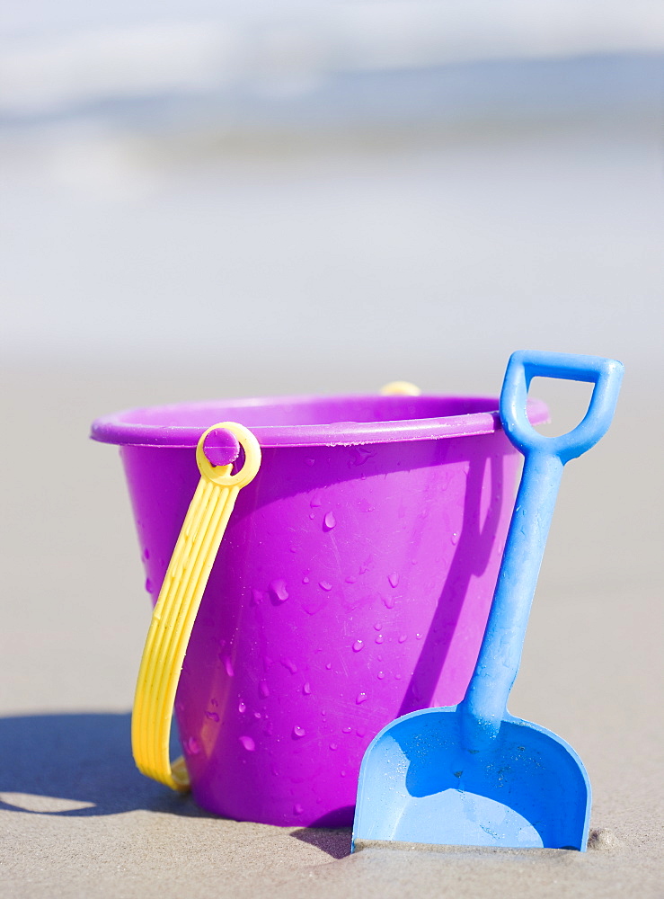 Bucket and shovel on beach