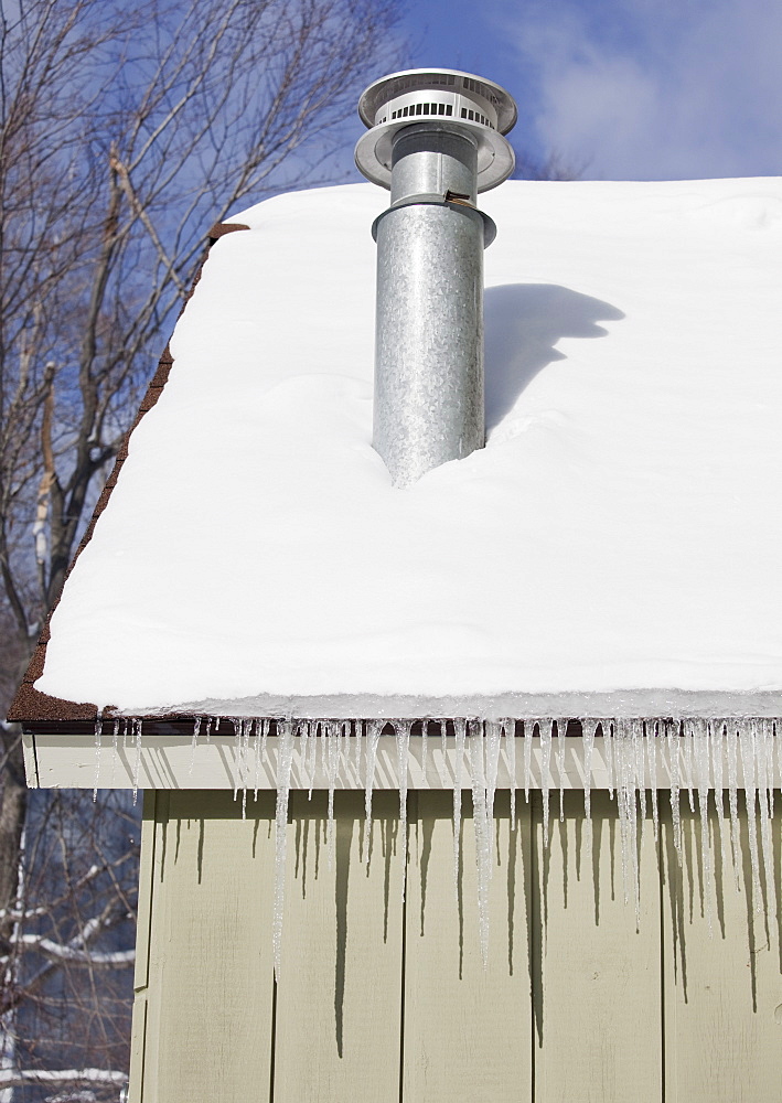 Icicles hanging from roof eaves