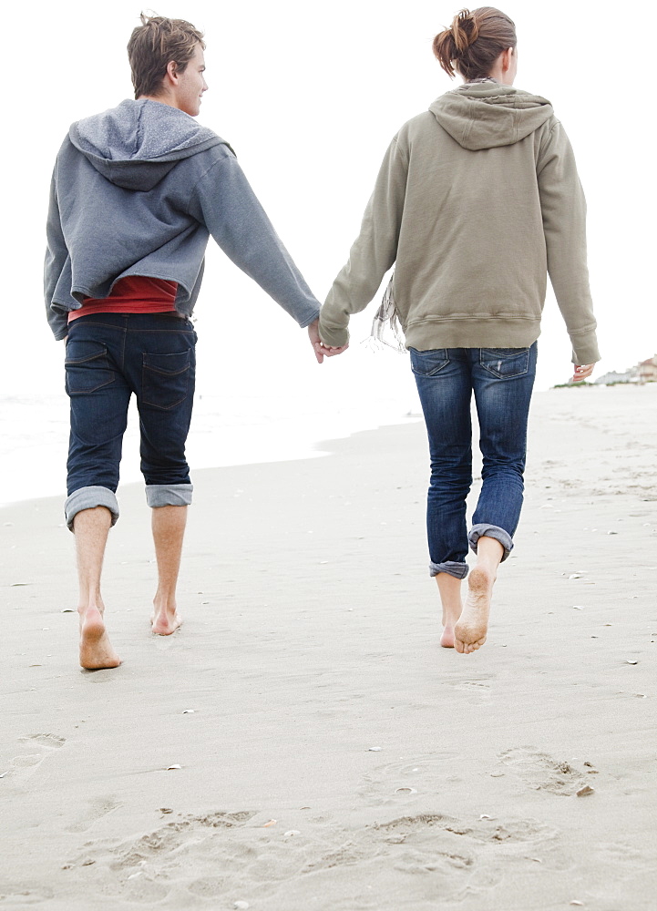 Couple holding hands