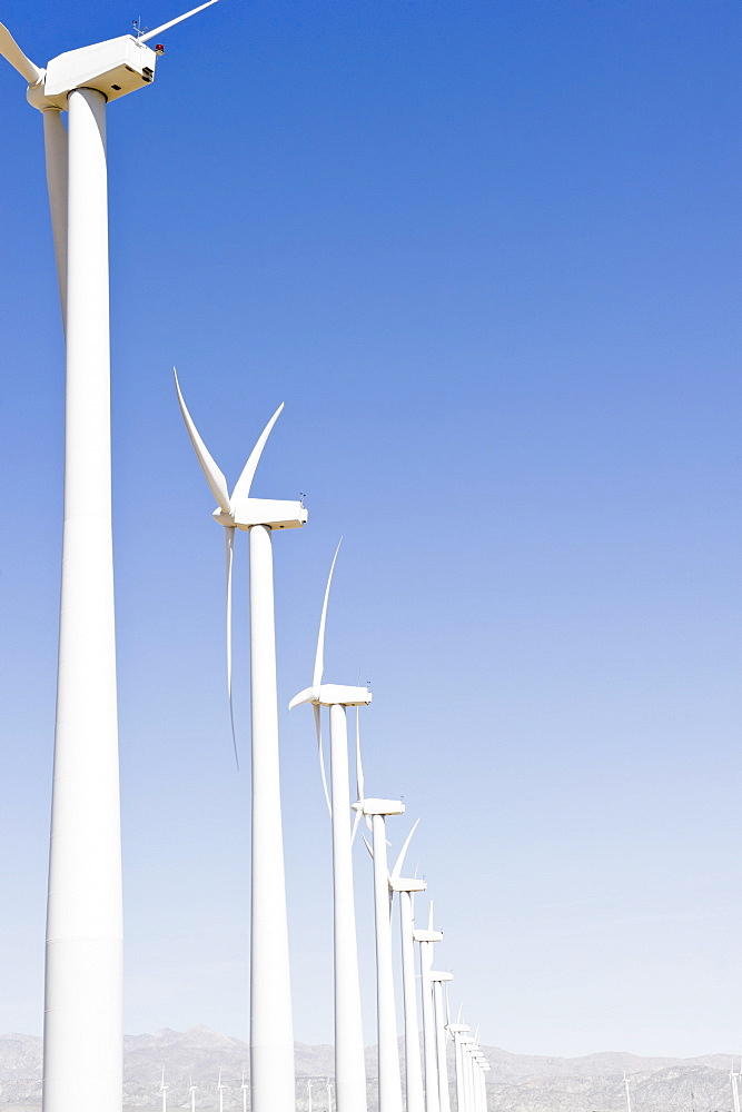 USA, California, Palm Springs, Coachella Valley, San Gorgonio Pass, Wind turbines against blue sky