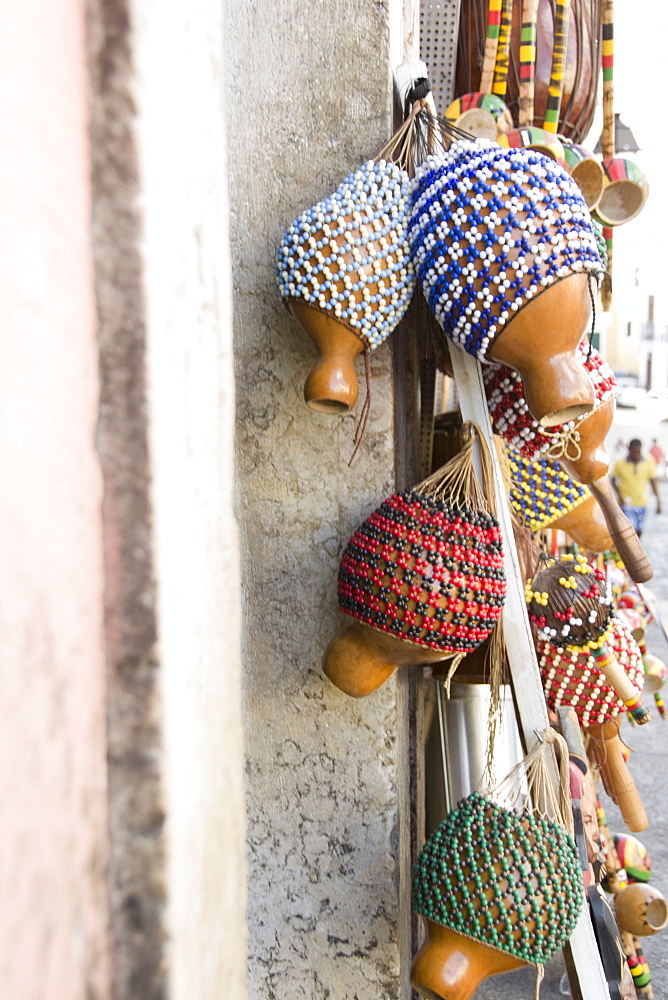 Brazil, Bahia, Salvador De Bahia, Rattles hanging against wall, close-up