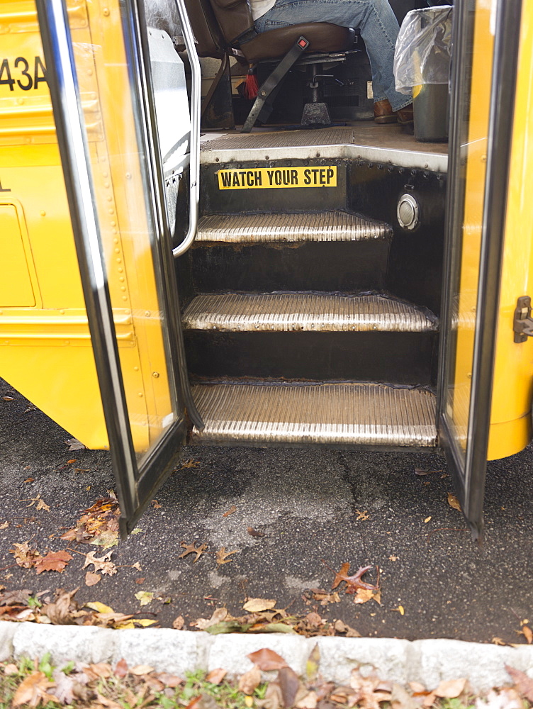 Close up of open door of school bus