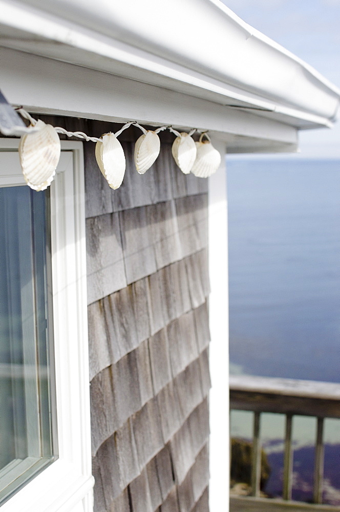 Shell decoration hanging on summer house on coast, USA, Massachusetts, Plymouth