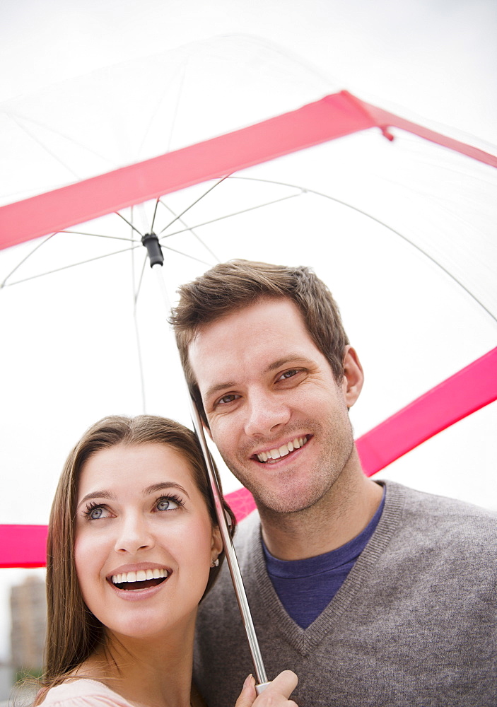 Couple under umbrella