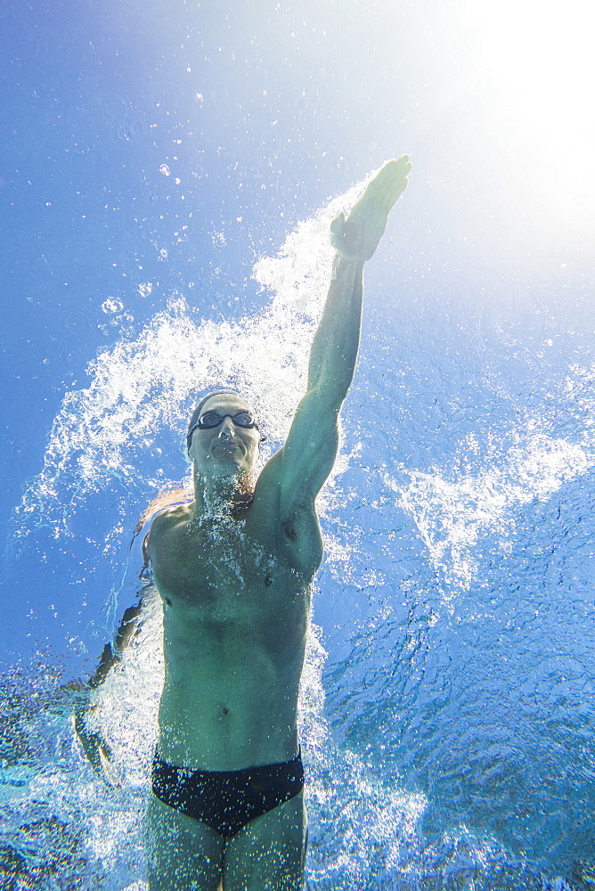 Underwater view of athletic swimmer