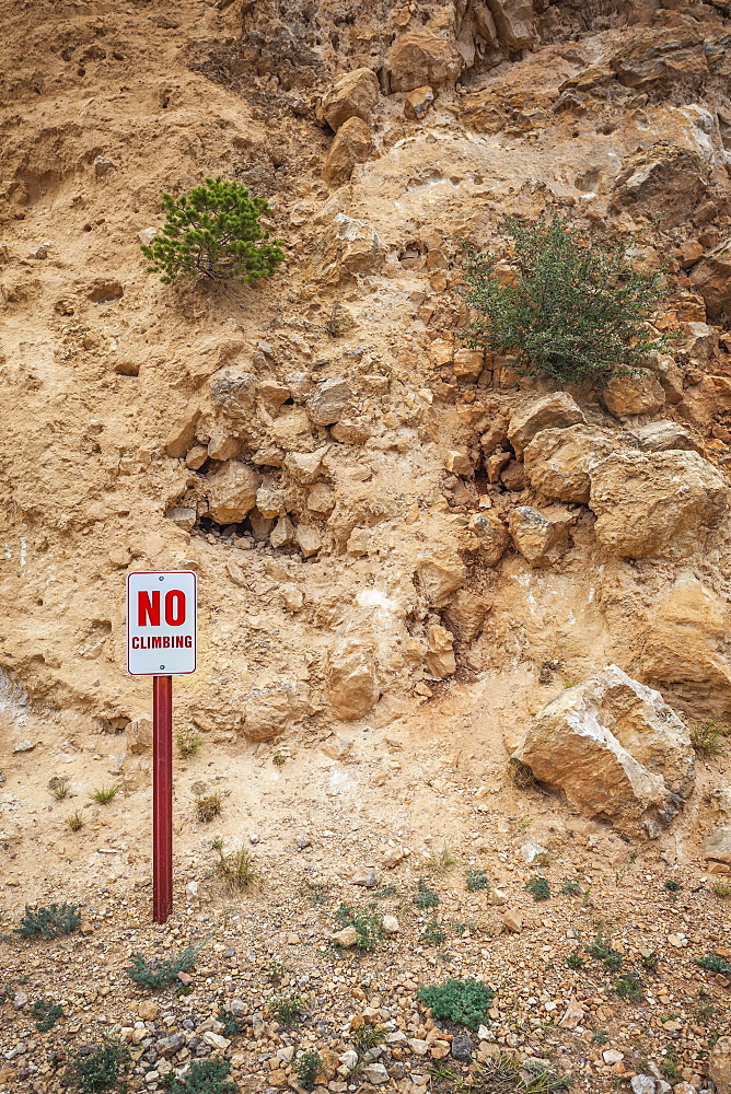 No Climbing sign against hillside, USA, Colorado, Colorado Springs