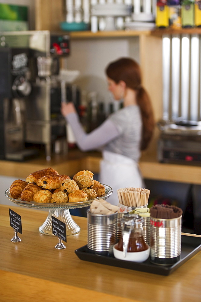 Woman working in coffee shop