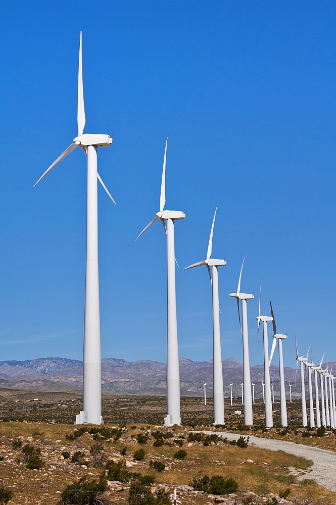 USA, California, Palm Springs, Wind turbines against blue sky