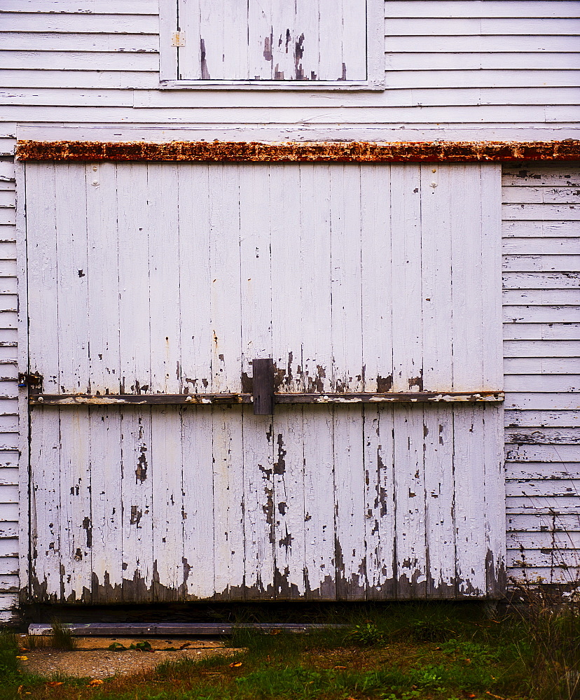 Weathered white barn door, Camden, Maine